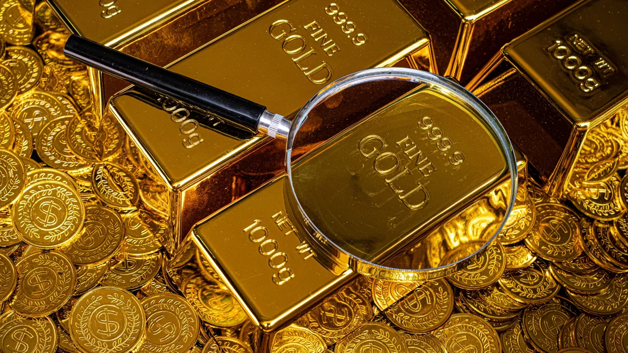 Qual é a relação entre dólar e ouro?